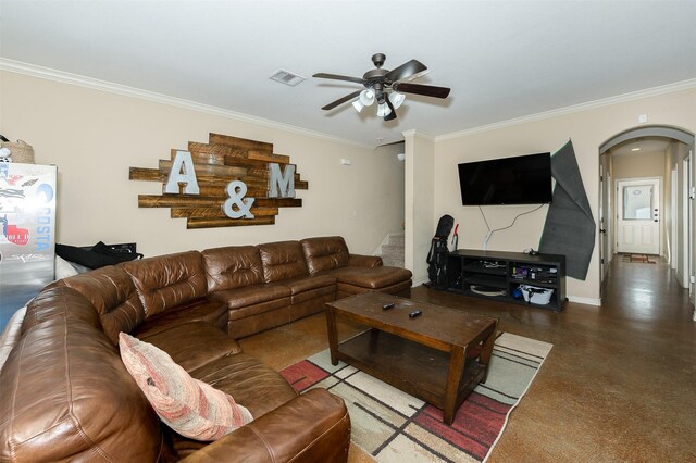 215 Capps Dr, College Station, TX 77845 - living room featuring arched walkways, crown molding, and a ceiling fan