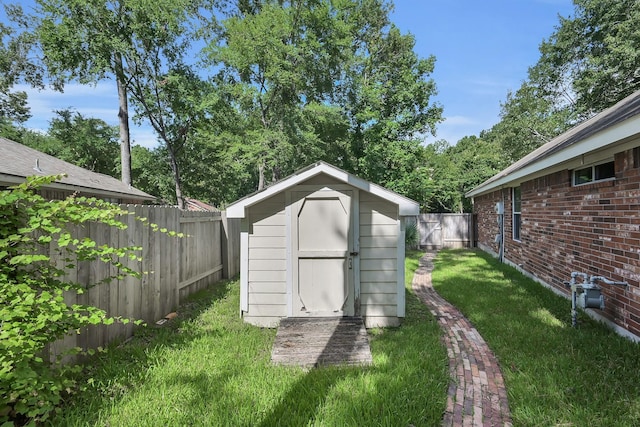 107 W Russet Grove Cir, The Woodlands, TX 77384 - view of shed with a fenced backyard