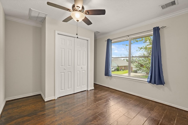 5003 Blanco Dr, Pearland, TX 77584 - unfurnished bedroom with wood finished floors, crown molding, a closet, and ceiling fan