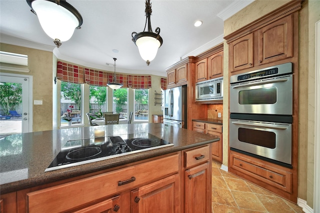 23815 Enchanted Xing, Katy, TX 77494 - kitchen with appliances with stainless steel finishes, ornamental molding, brown cabinets, hanging light fixtures, and dark stone countertops