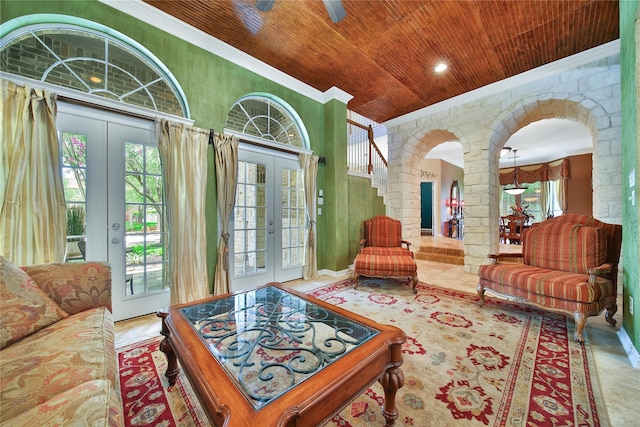 23815 Enchanted Xing, Katy, TX 77494 - living room featuring wood ceiling, french doors, ornamental molding, arched walkways, and healthy amount of natural light