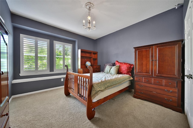 23815 Enchanted Xing, Katy, TX 77494 - bedroom with a chandelier and carpet floors
