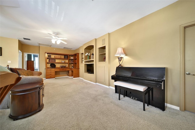 23815 Enchanted Xing, Katy, TX 77494 - carpeted living room with a ceiling fan and built in features