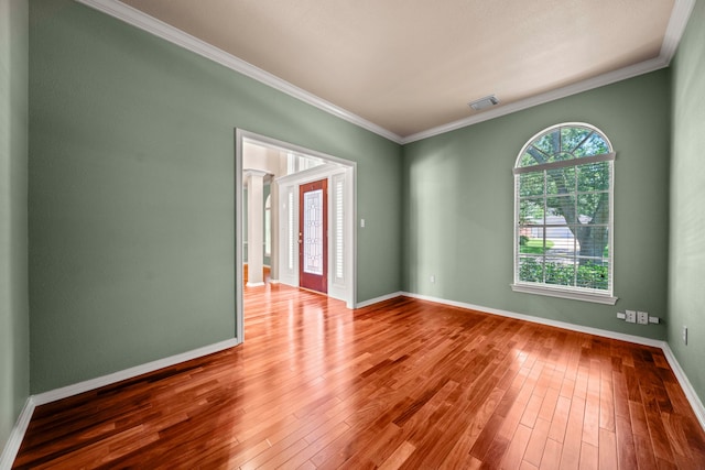 1808 Brookside Dr, Friendswood, TX 77546 - unfurnished room featuring ornamental molding and hardwood / wood-style floors