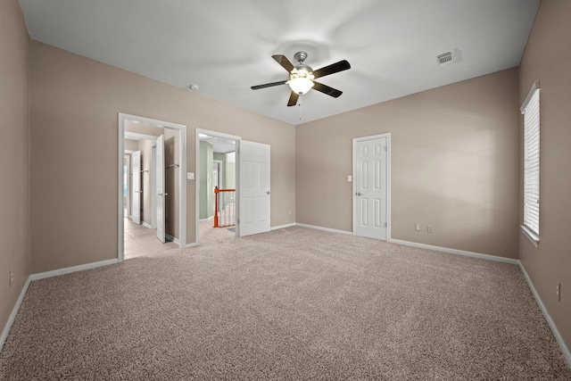1808 Brookside Dr, Friendswood, TX 77546 - unfurnished bedroom with multiple windows, light carpet, and ceiling fan