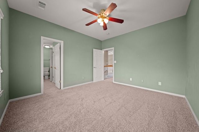 1808 Brookside Dr, Friendswood, TX 77546 - unfurnished bedroom featuring carpet flooring, a ceiling fan, and ensuite bath