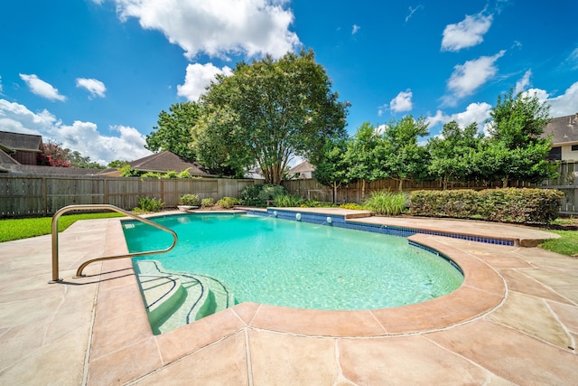 1808 Brookside Dr, Friendswood, TX 77546 - view of pool with a fenced backyard, a patio area, and a diving board