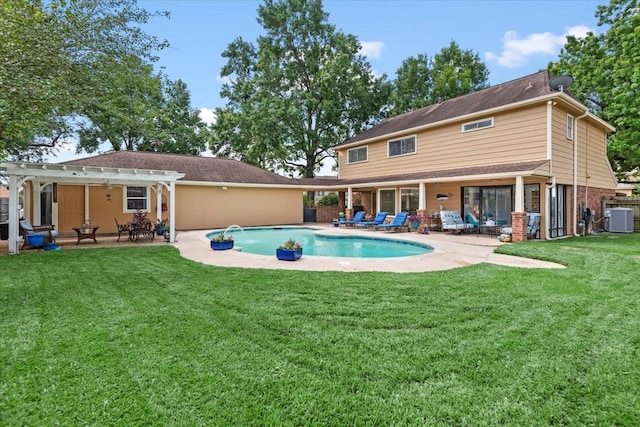 15502 Rana Ct, Houston, TX 77068 - back of house featuring a pergola, a patio area, an outdoor pool, a yard, and brick siding
