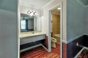 2884 W Fm 1988, Livingston, TX 77351 - full bathroom featuring vanity, crown molding, and wood finished floors