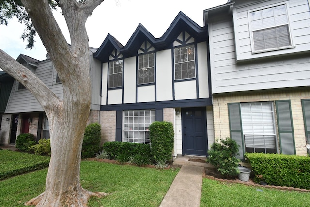 10018 Knoboak Dr Unit 21, Houston, TX 77080 - view of front of property with brick siding and a front yard