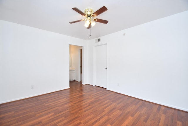 10018 Knoboak Dr Unit 21, Houston, TX 77080 - spare room featuring dark wood-style flooring and a ceiling fan