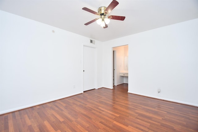 10018 Knoboak Dr Unit 21, Houston, TX 77080 - unfurnished bedroom featuring wood finished floors, ensuite bathroom, and a ceiling fan