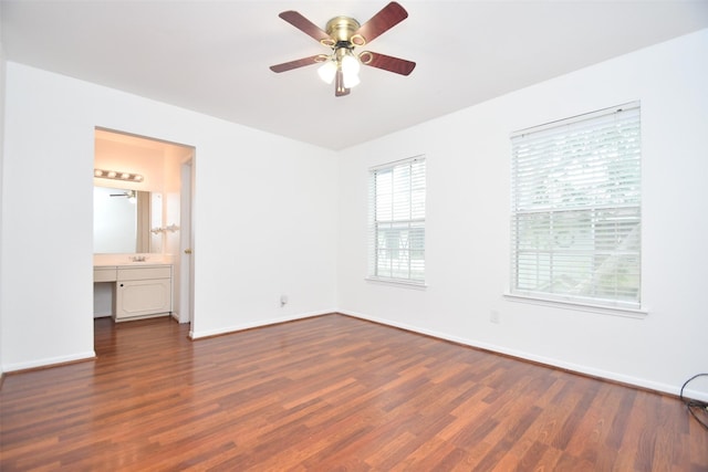 10018 Knoboak Dr Unit 21, Houston, TX 77080 - empty room with wood finished floors, a ceiling fan, and an office area