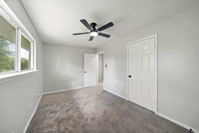21710 Rotherham Dr, Spring, TX 77388 - unfurnished bedroom with carpet and ceiling fan