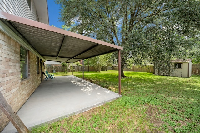 21710 Rotherham Dr, Spring, TX 77388 - fenced backyard featuring a patio and a storage unit