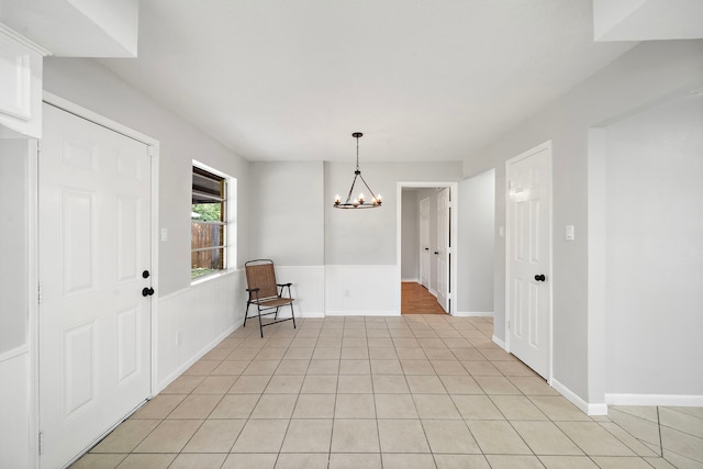 21710 Rotherham Dr, Spring, TX 77388 - entryway with a chandelier and light tile patterned flooring