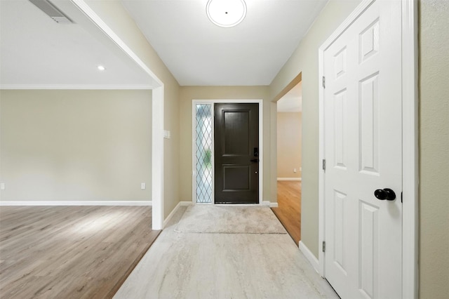 11726 Gardenglen Dr, Houston, TX 77070 - entrance foyer featuring light wood finished floors and baseboards