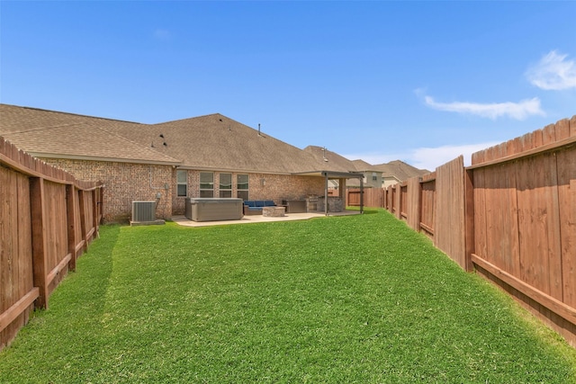 505 Ozark Ct, League City, TX 77573 - fenced backyard featuring a patio, outdoor lounge area, and a hot tub