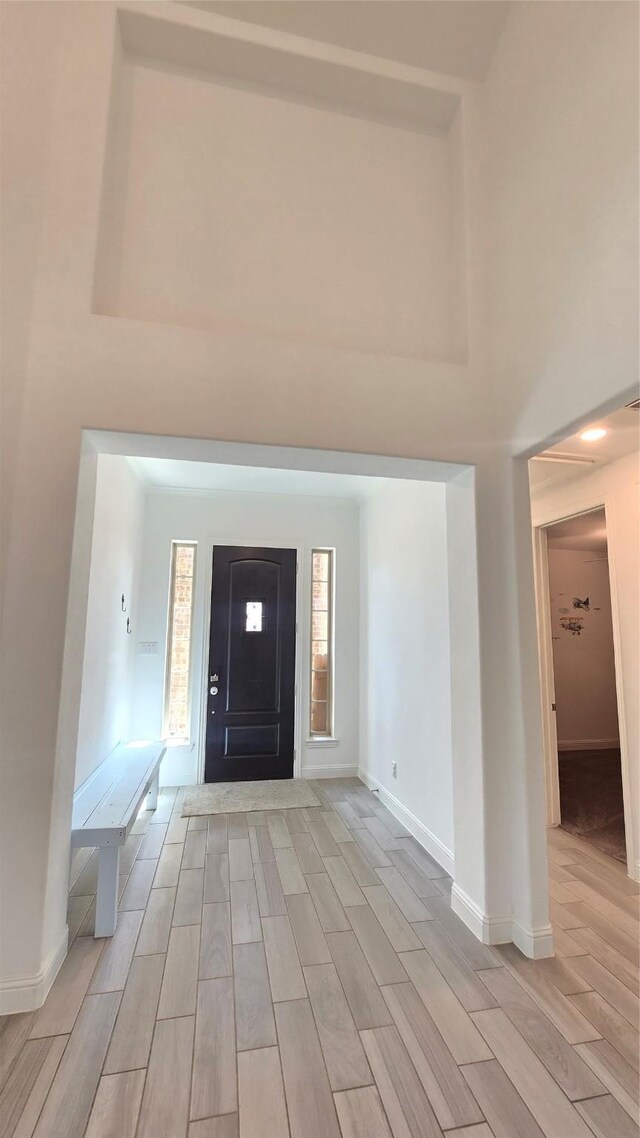 505 Ozark Ct, League City, TX 77573 - entryway with light wood finished floors and a high ceiling