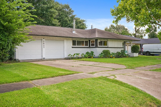 5411 Meadow Creek Ln, Houston, TX 77017 - single story home featuring brick siding, an attached garage, concrete driveway, a front yard, and roof with shingles