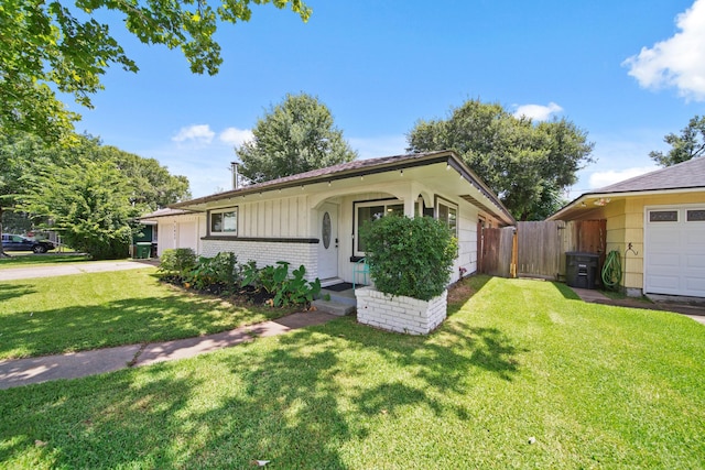 5411 Meadow Creek Ln, Houston, TX 77017 - ranch-style home featuring brick siding, driveway, and an attached garage