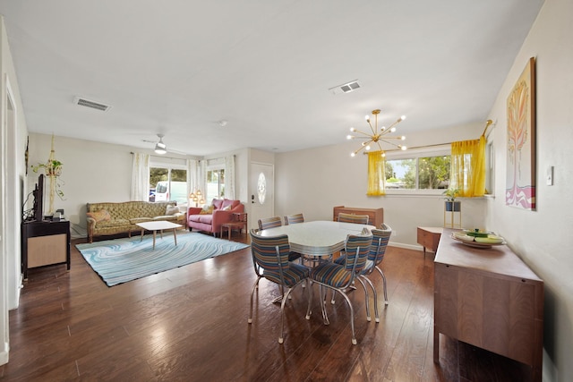 5411 Meadow Creek Ln, Houston, TX 77017 - dining space featuring wood finished floors, a ceiling fan, and a chandelier