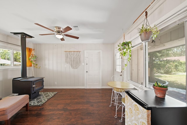 5411 Meadow Creek Ln, Houston, TX 77017 - foyer entrance with a wood stove, ceiling fan, and wood finished floors