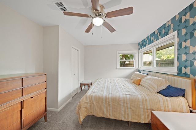 5411 Meadow Creek Ln, Houston, TX 77017 - bedroom with carpet floors, a ceiling fan, and wallpapered walls