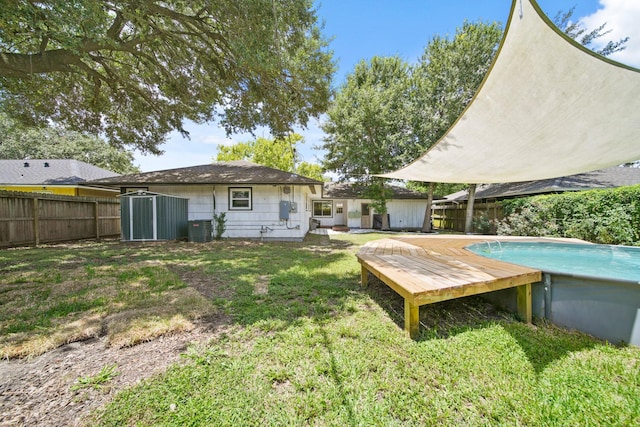 5411 Meadow Creek Ln, Houston, TX 77017 - fenced backyard with a storage unit