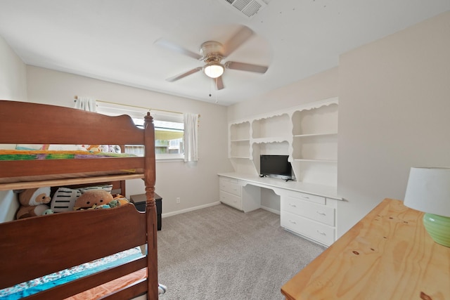 5411 Meadow Creek Ln, Houston, TX 77017 - carpeted bedroom featuring ceiling fan and built in desk