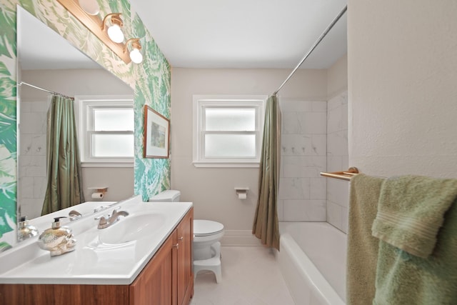 5411 Meadow Creek Ln, Houston, TX 77017 - full bathroom featuring vanity, healthy amount of natural light, shower / bath combo, and tile patterned flooring