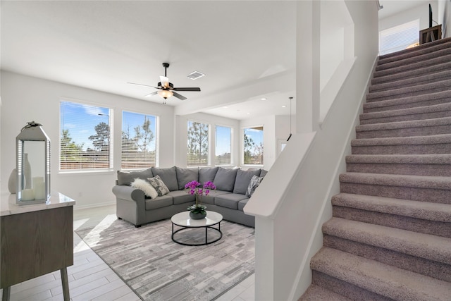 648 Silver Pear Ct, Montgomery, TX 77316 - living area featuring stairs, ceiling fan, and recessed lighting