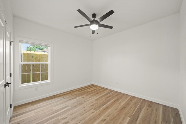 6206 Lyndhurst Dr, Houston, TX 77087 - empty room featuring light wood-style flooring and ceiling fan