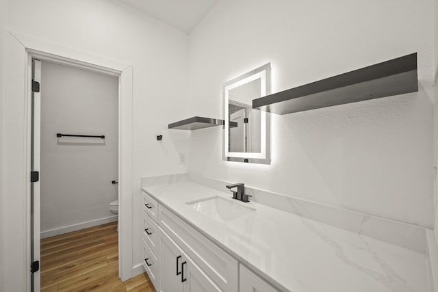 6206 Lyndhurst Dr, Houston, TX 77087 - bathroom featuring vanity and wood finished floors