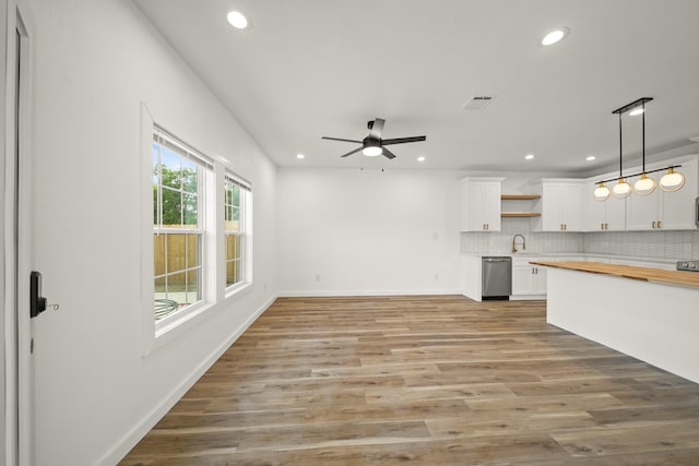 6206 Lyndhurst Dr, Houston, TX 77087 - unfurnished living room featuring recessed lighting, a ceiling fan, and light wood-style flooring