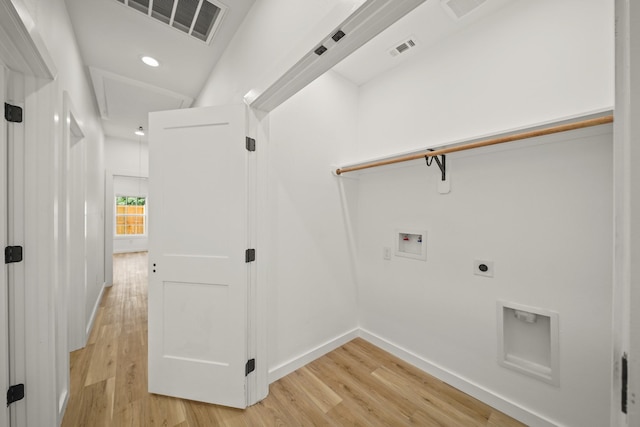 6206 Lyndhurst Dr, Houston, TX 77087 - laundry area with washer hookup, hookup for an electric dryer, light wood-type flooring, and recessed lighting