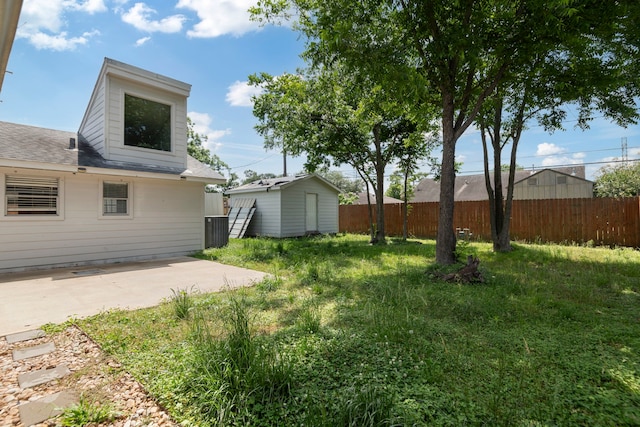 8631 Alcott Dr, Houston, TX 77080 - view of yard with a patio and a storage unit