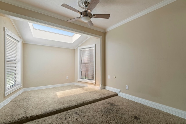 8631 Alcott Dr, Houston, TX 77080 - unfurnished room with a skylight, lofted ceiling, carpet flooring, a ceiling fan, and plenty of natural light
