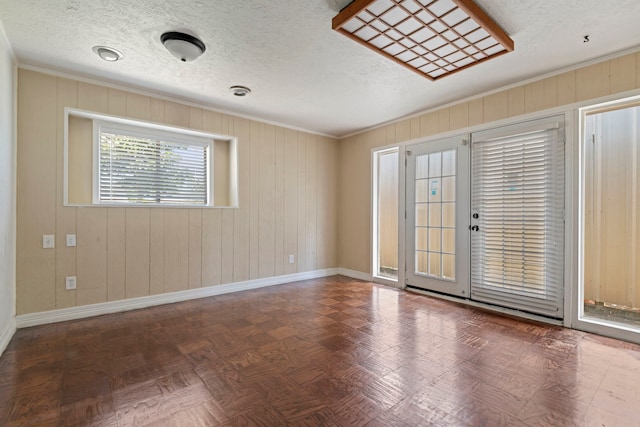8631 Alcott Dr, Houston, TX 77080 - spare room with crown molding and a textured ceiling