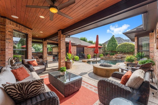 12218 Johns Enterprise Ct, Cypress, TX 77433 - fenced backyard featuring an outdoor living space with a fire pit and a patio
