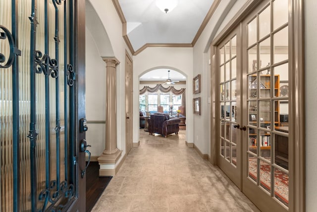 12218 Johns Enterprise Ct, Cypress, TX 77433 - entryway featuring french doors, ornamental molding, decorative columns, and arched walkways