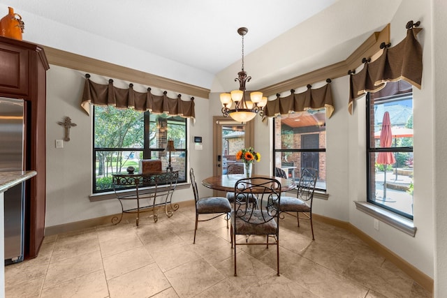 12218 Johns Enterprise Ct, Cypress, TX 77433 - dining space with plenty of natural light, a chandelier, and lofted ceiling