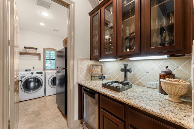 12218 Johns Enterprise Ct, Cypress, TX 77433 - laundry area featuring washer and dryer and beverage cooler