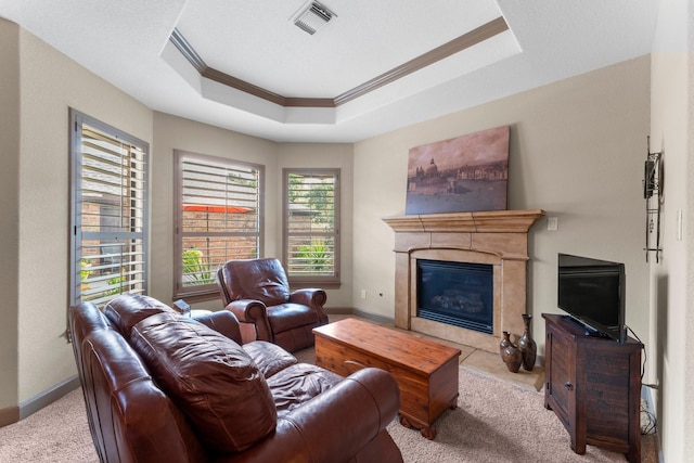 12218 Johns Enterprise Ct, Cypress, TX 77433 - living room featuring crown molding, a tray ceiling, a high end fireplace, and carpet floors