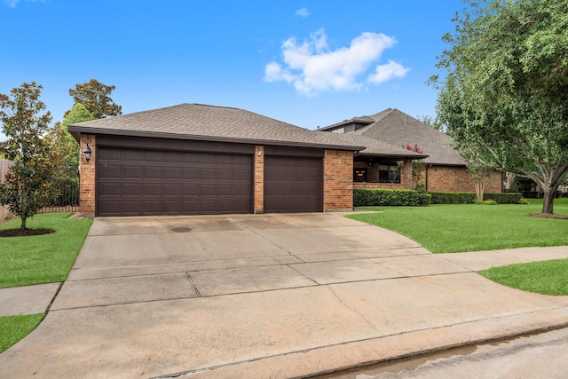 12218 Johns Enterprise Ct, Cypress, TX 77433 - view of front of home featuring brick siding, concrete driveway, an attached garage, and a shingled roof