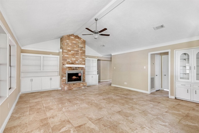 16107 Holly St, Porter, TX 77365 - unfurnished living room with a ceiling fan, built in shelves, a brick fireplace, lofted ceiling, and ornamental molding