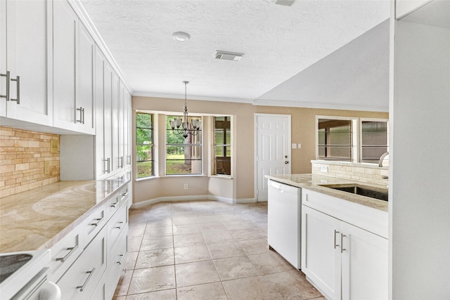 16107 Holly St, Porter, TX 77365 - kitchen featuring dishwasher, a chandelier, light stone countertops, white cabinetry, and a textured ceiling
