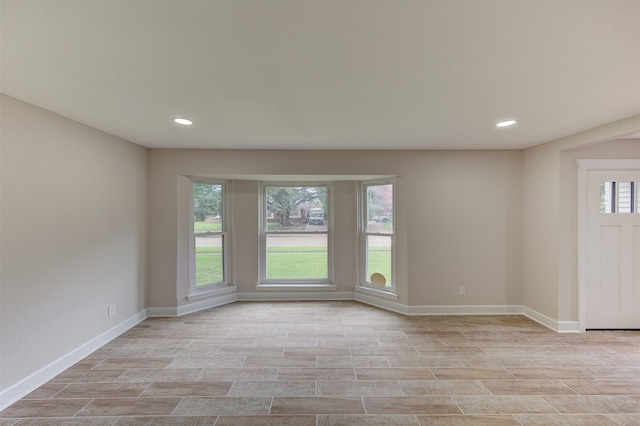 8822 Rowan Ln, Houston, TX 77036 - spare room featuring recessed lighting and light wood-type flooring