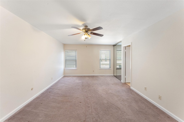 11614 Village Place Dr Unit 337, Houston, TX 77077 - empty room with ceiling fan and carpet floors