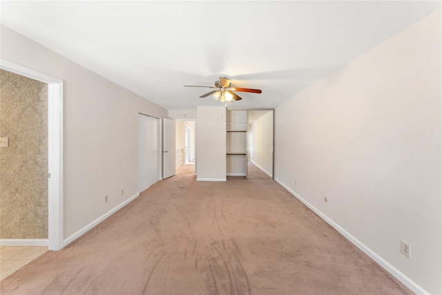 11614 Village Place Dr Unit 337, Houston, TX 77077 - unfurnished bedroom with light colored carpet and ceiling fan